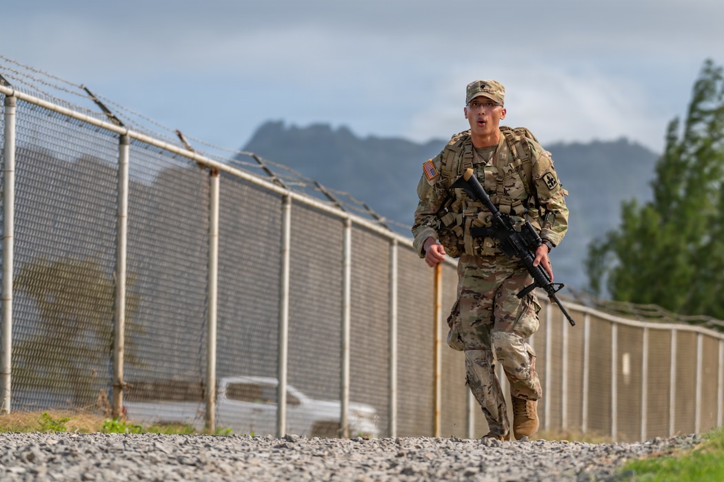 U.S. Army Spc. Danton D. Dacquel, an allied trades specialist assigned to Bravo Company, 29th Brigade Support Battalion, 29th Infantry Brigade Combat Team, Hawaii Army National Guard (HIARNG), participates in the foot march event during the HIARNG Best Warrior Competition in Waimanalo, Hawaii, March 6, 2026.