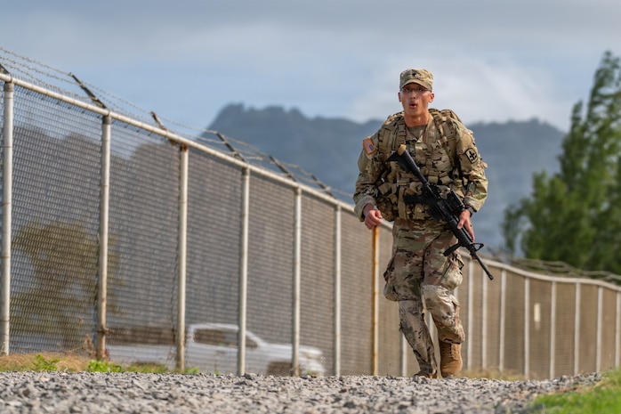 U.S. Army Spc. Danton D. Dacquel, an allied trades specialist assigned to Bravo Company, 29th Brigade Support Battalion, 29th Infantry Brigade Combat Team, Hawaii Army National Guard (HIARNG), participates in the foot march event during the HIARNG Best Warrior Competition in Waimanalo, Hawaii, March 6, 2026.