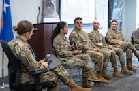 Image of Airmen and Guardians talking on a panel.