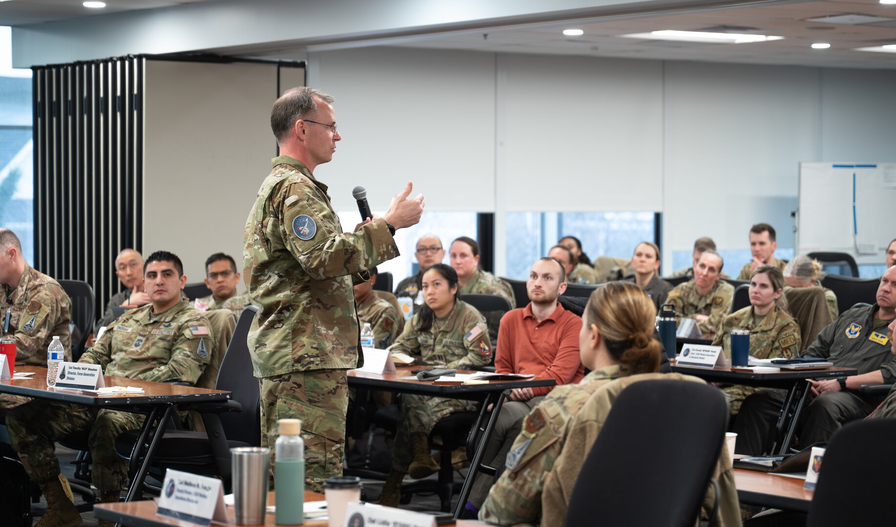 Image of a Guardian talking to a crowd.
