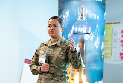 Image of a Guardian talking to a crowd.