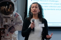 Image of a civilian talking to a crowd.