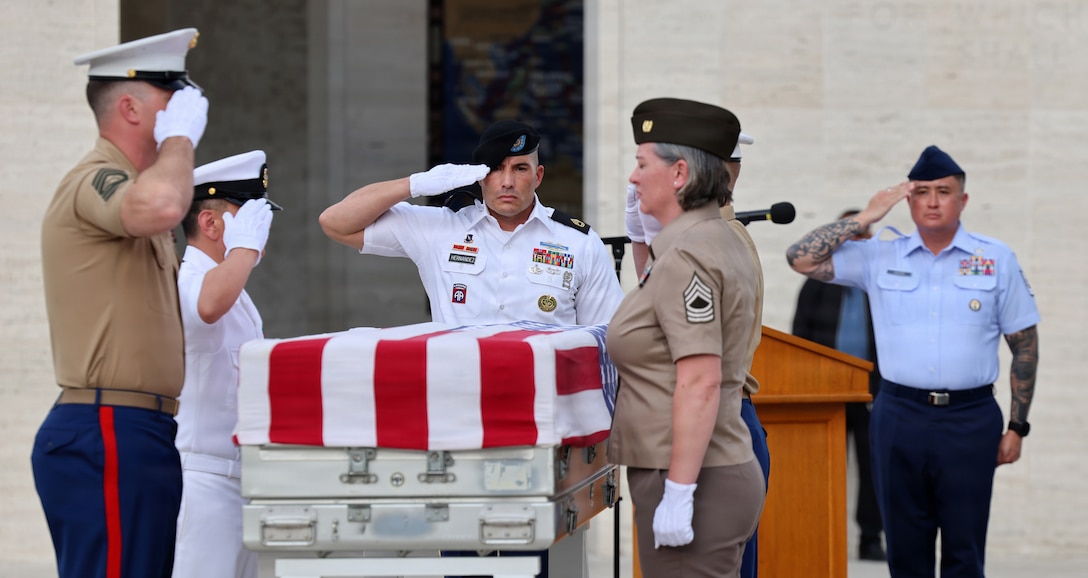 Members of the Defense POW/MIA Accounting Agency and the Joint U.S. Military Assistance Group Philippines render salutes while Taps is played during the first-ever Repatriation Ceremony held at the Manila American Cemetery and Memorial in the Philippines for U.S. personnel who were disinterred there, March 6, 2026. Currently, there are 71,783 U.S. personnel unaccounted for from World War II with approximately 10,000 missing in the Philippines, the largest total for any single country. (U.S. Air Force Photo by Lt. Col. George Tobias)