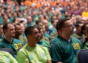 Squadron Officer School and the Senior Noncommissioned Officer Academy students listen during a combined operations welcome at Maxwell Air Force Base, Alabama, March 5, 2026. (U.S. Air Force photo by Airman 1st Class Nelvis Sera)