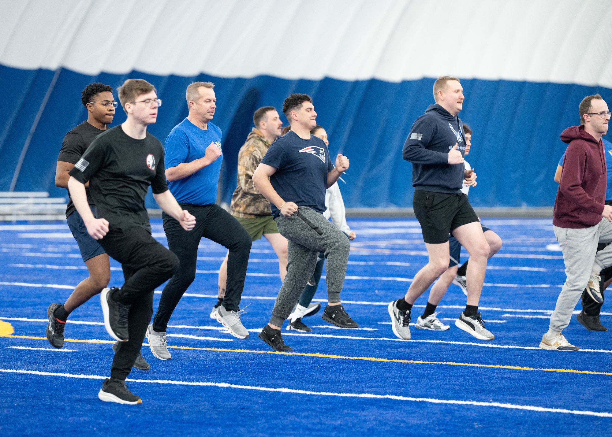 Airmen exercise together.