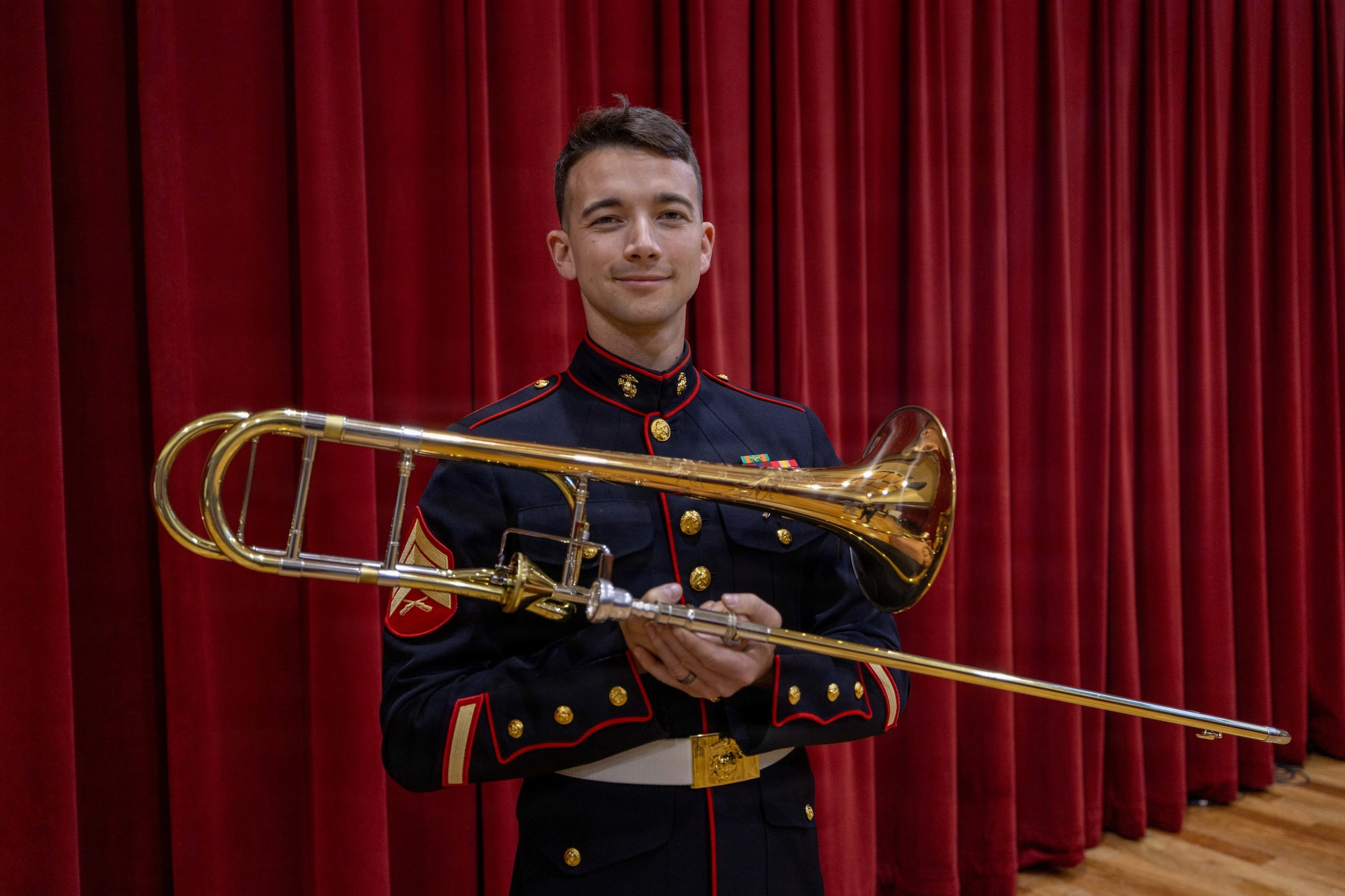 U.S. Marine Corps Sgt. Justin Napier, trombone instrumentalist, with the Marine Forces Reserve Band, poses for a portrait at the Marine Corps Support Facility, New Orleans, Feb. 5, 2026. Napier earned the United States Marine Corps Musician of the Year Award due to his excellency in his occupation and his initiative in both taking charge and nurturing his junior Marines shortly after joining the Marine Forces Reserve Band. (U.S. Marine Corps photo by Lance Cpl. Jazmin Sierra)