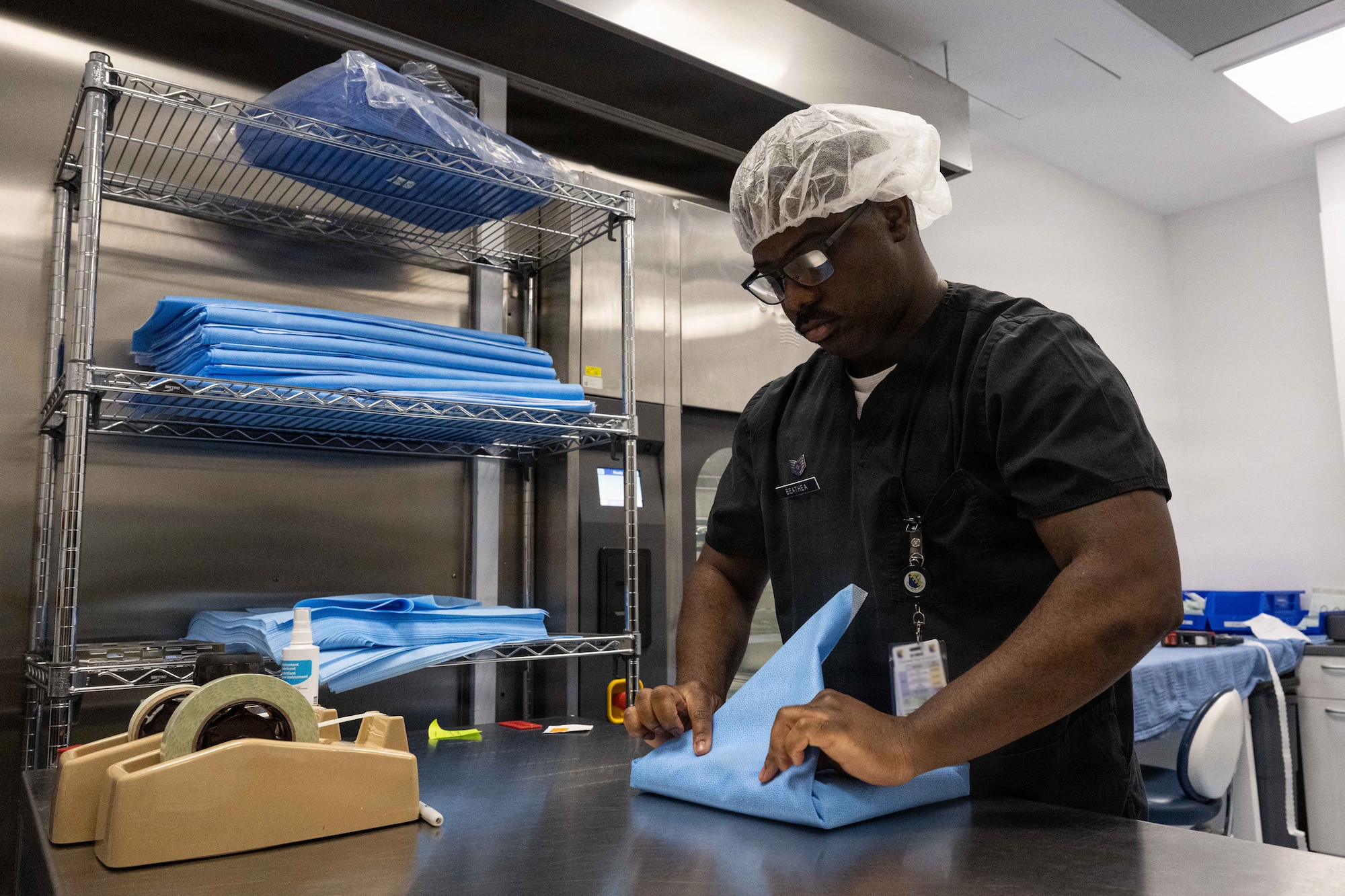 An Airman prepares dental equipment.