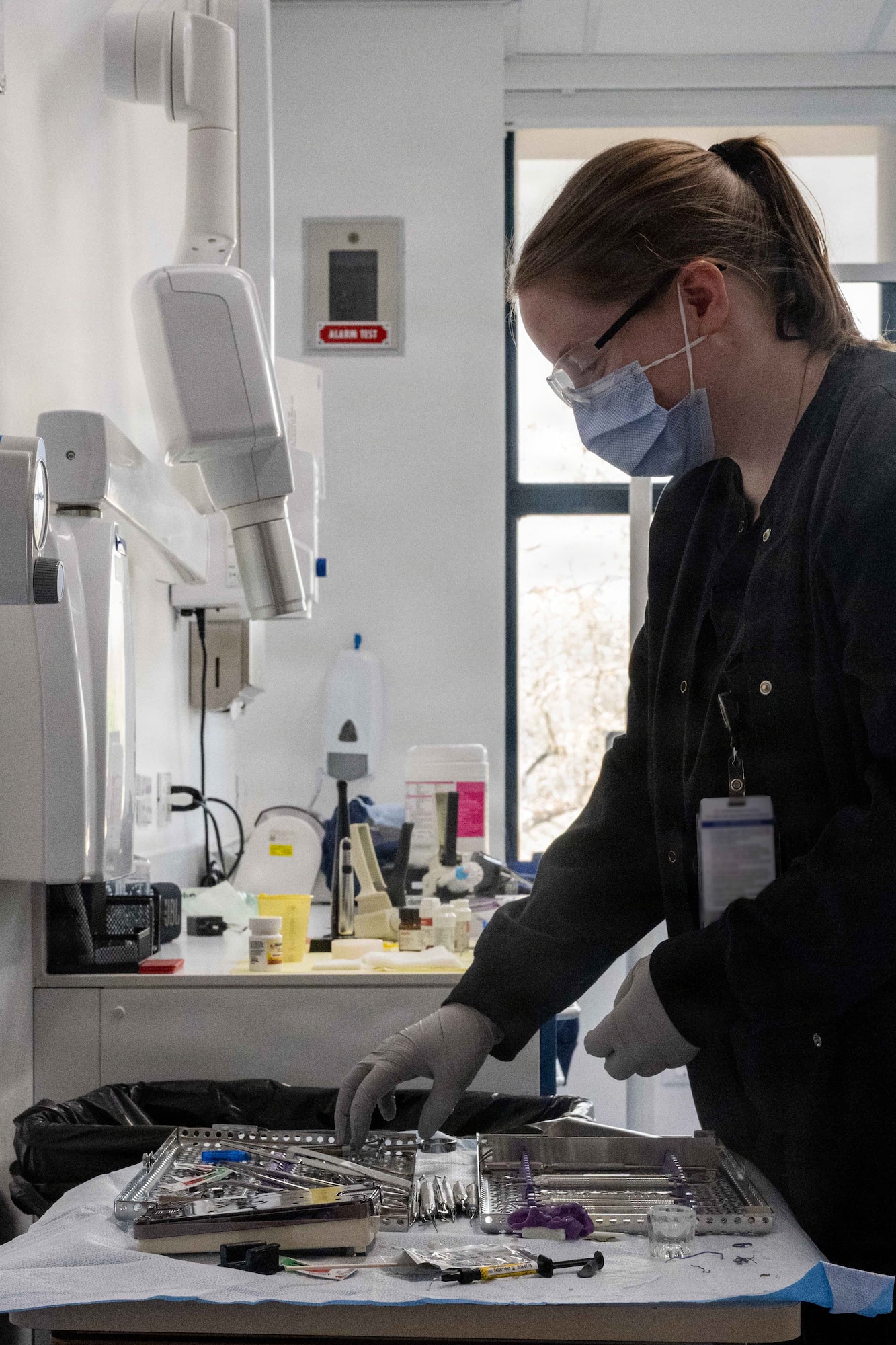 An Airman prepares a dental room.