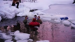 BRIDGEPORT, Calif. (Feb. 23, 2026) Military medical students, enrolled in Marine Corps Mountain Warfare Center’s Mountain Medicine course, participate in Naval Health Research Center’s (NHRC) cold-water immersion study. For the next 10 minutes these students will endure 34-degree water and below freezing air temperatures while their instructors watch and instruct them to do finger dexterity exercises; giving the students a chance to test their dexterity and cognitive response abilities in real time. In the final two minutes, students remove their masks & portable spirometer and answer a series of questions related to their current stress levels, body temperature and shivering. Through its cold-water immersion studies, NHRC develops life-saving strategies that enable the warfighter to overcome the initial, lethal shock of entering frigid water. This vital research provides U.S. Naval, Marine Corps, and joint forces with the tools to maintain cognitive function and enhance survivability in the most extreme maritime environments. (U.S. Navy photo by Matthew Reyes/released)