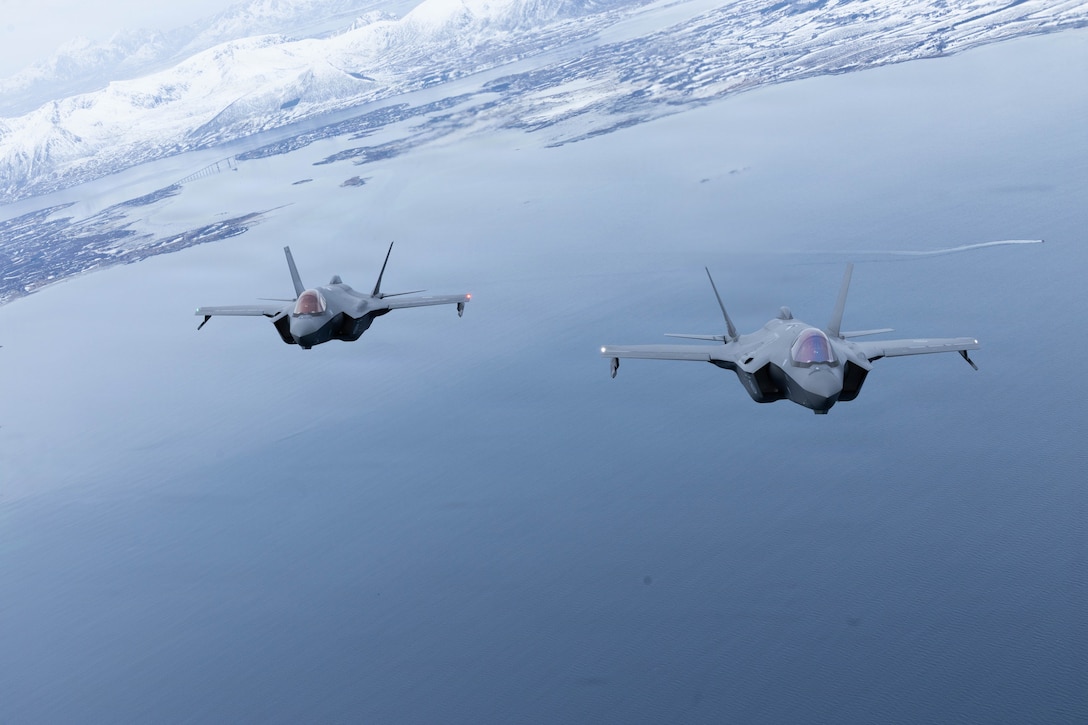 F-35A Lightning II aircraft with the U.S. Air Force’s 48th Fighter Wing and the Royal Norwegian Air Force fly in formation near Lofoten, Norway, March 10, 2026. The formation flight symbolized the partnership and interoperability displayed between participating NATO militaries during exercise Cold Response 26. A key component of NATO's enhanced vigilance activity Arctic Sentry, exercise Cold Response 26 is a Norwegian-led winter military exercise designed to enhance collective defense capabilities and ensure U.S. readiness to rapidly deploy and seamlessly operate alongside NATO Allies in challenging arctic conditions. (U.S. Marine Corps photo by Cpl. Mya Seymour)