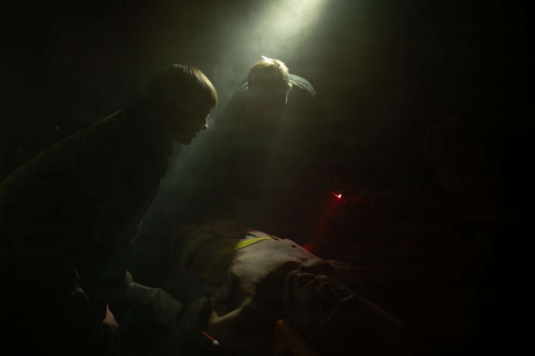 U.S. Marines and Sailors with the 22nd Marine Expeditionary Unit (Special Operations Capable) train IV placement in low-light environments aboard San Antonio-class amphibious transport dock USS San Antonio (LPD 17) while underway in the Caribbean Sea, Mar. 7, 2026. U.S. military forces are deployed to the Caribbean in support of the U.S. Southern Command mission, Department of War-directed operations, and the president’s priorities to disrupt illicit drug trafficking and protect the homeland. (U.S. Marine Corps photo)