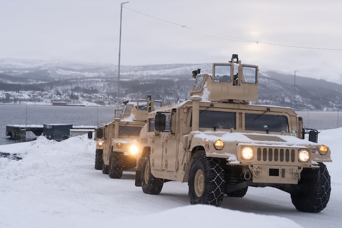 U.S. Marines with 2nd Distribution Support Battalion, Combat Logistics Regiment 27, 2nd Marine Logistics Group, conduct a tactical convoy in preparation for exercise Cold Response 26 in Sorresia, Norway, Feb. 11, 2026. Marines with CLR-27 arrival and assembly operations group transport ground equipment and logistical supplies for future dissemination of assets to support and sustain operations across various levels of a Marine Air-Ground Task Force. A key component of NATO's enhanced vigilance activity Arctic Sentry, exercise Cold Response 26 is a Norwegian-led winter military exercise designed to enhance collective defense capabilities and ensure U.S. readiness to rapidly deploy and seamlessly operate alongside NATO Allies in challenging arctic conditions. (U.S. Marine Corps photo by Lance Cpl. Javier Santillan)