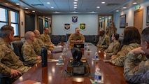 U.S. Air Force Col. Gregory Coleman (center right), Air Force Global Strike Command surgeon general, speaks to base leadership during a visit at Minot Air Force Base, North Dakota, Feb. 25, 2026. Coleman visited the base to gain a deeper understanding of the operational capabilities of Minot AFB’s 5th Medical Group. (U.S. Air Force photo by Senior Airman Kyle Wilson)