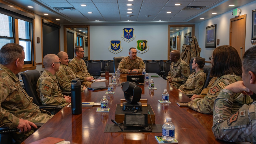 U.S. Air Force Col. Gregory Coleman (center right), Air Force Global Strike Command surgeon general, speaks to base leadership during a visit at Minot Air Force Base, North Dakota, Feb. 25, 2026. Coleman visited the base to gain a deeper understanding of the operational capabilities of Minot AFB’s 5th Medical Group. (U.S. Air Force photo by Senior Airman Kyle Wilson)