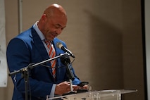U.S. Air Force Reserve Lt. Col. Barry Davis, Lesser Antilles Medical Assistance Team (LAMAT) 2026 mission commander and general surgeon with the 926th Aerospace Medicine Squadron, speaks during the closing ceremony in Frigate Bay, Saint Kitts and Nevis, March 6, 2026. Davis worked alongside Ministry of Health medical professionals during the two-week engagement while overseeing U.S. medical teams operating across the federation. (U.S. Air Force photo by Andrea Jenkins)