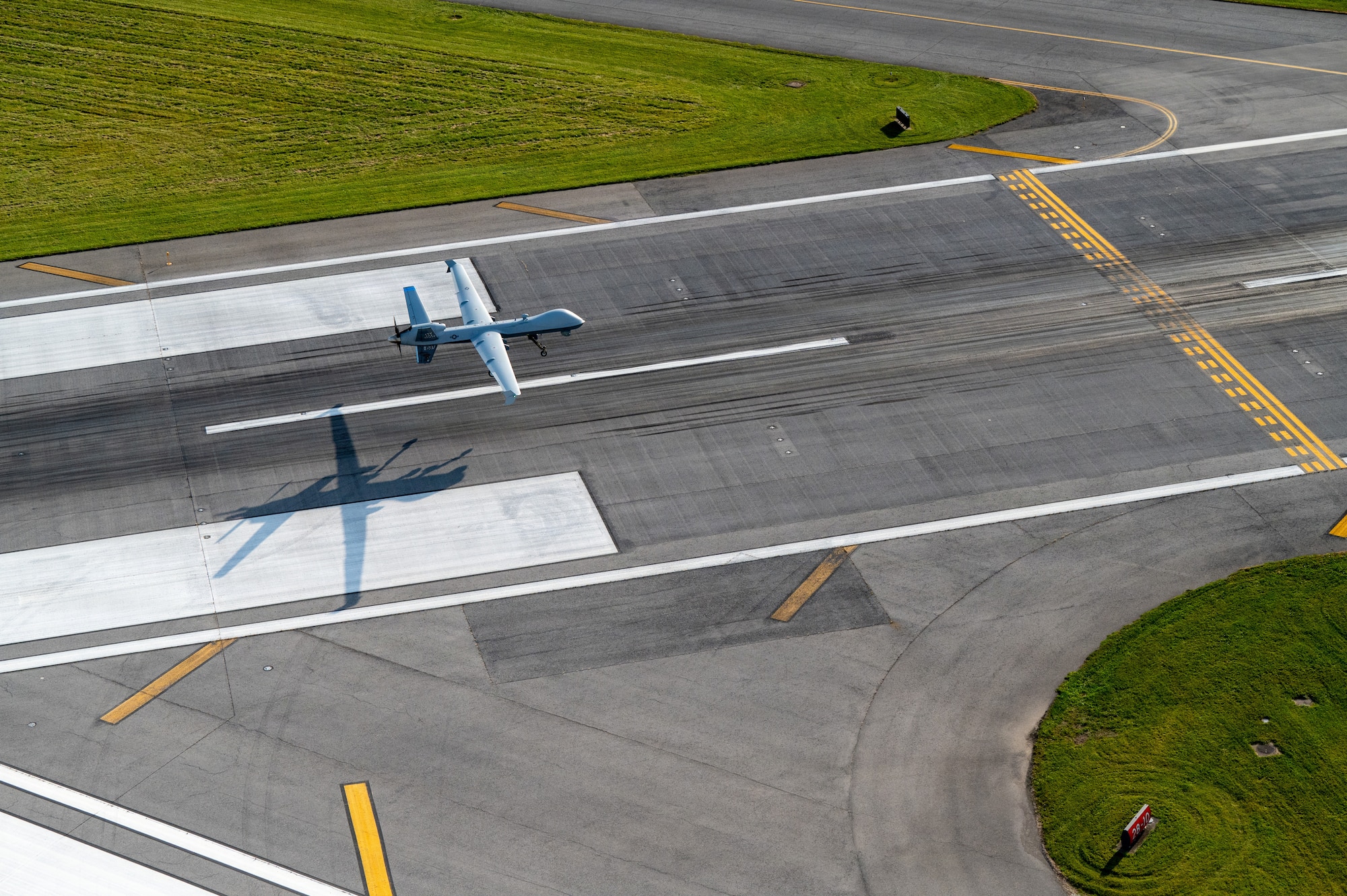 A MQ-9 Reaper assigned to the 174th Attack Wing lands at Hancock Field Air National Guard Base, Syracuse, NY, following a routine training flight, Oct. 31, 2024. The 108th Attack Squadron conducts these flights to instruct pilots and sensor operators on proper flight operations of the aircraft. (U.S. Air National Guard photo by Senior Airman Dylan McCrink)