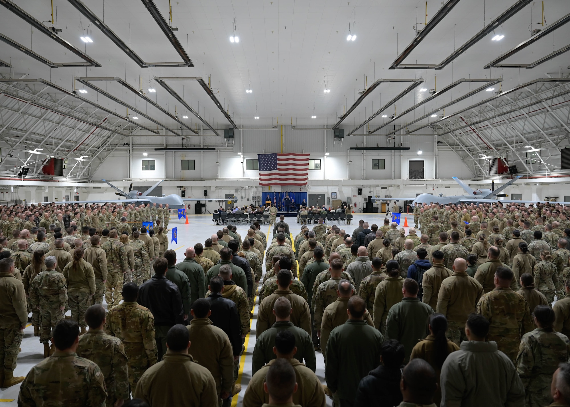 174th Attack Wing Airmen salute U.S. Air Force Col. Bret Batick, the new Wing Commander during a change of command ceremony at Hancock Field Air National Guard Base, NY, Dec. 6. nearly 1100 members of the New York Air National Guard were in attendance, alongside guests of honor such as elected officials and retired generals. (U.S. Air National Guard photo by Senior Airman Liam Eveleigh)