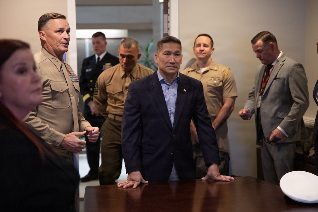 Lt. Gen. Leonard F. Anderson IV, left, commander of Marine Forces Reserve and Marine Forces South, briefs The Honorable Hung Cao, center, undersecretary of the Navy, center, during the Individual Ready Reserve muster at Arlington, Virginia, March 7, 2026. Marine Corps Individual Reserve Support Activity conducts administrative screenings of IRR Marines to ensure readiness to augment and reinforce the active component. (U.S. Marine Corps photo by Cpl Orion Stpierre)