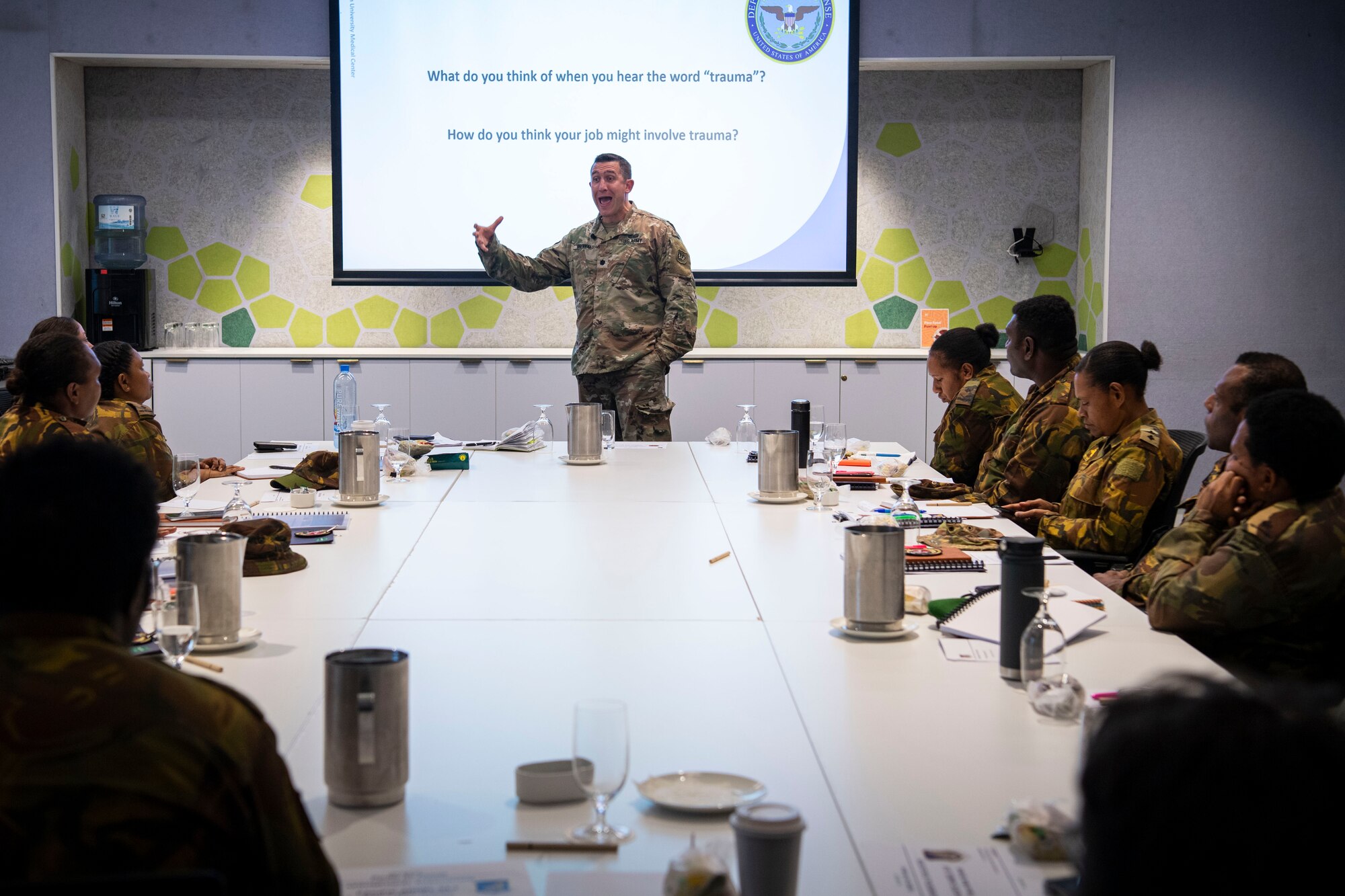 U.S. Army Lt. Col. Michael Brennan, Wisconsin National Guard Joint Force Headquarters deputy state surgeon, instructs Papua New Guinea Defence Force medical personnel on trauma and PTSD