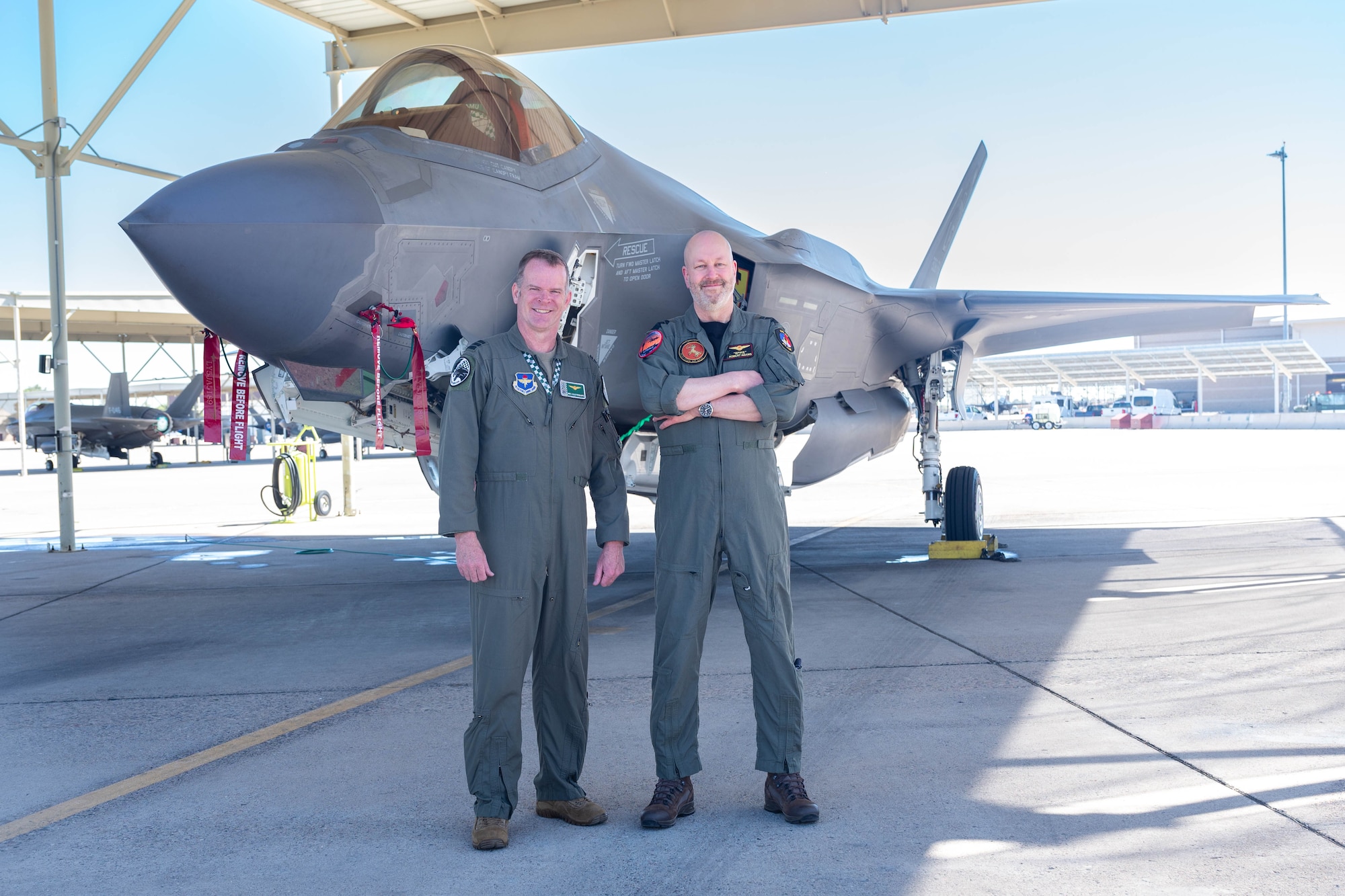 Royal Netherlands Air Force Lt. Col. Joseph Luijsterburg, RNLAF senior representative at the 308th Fighter Squadron and Maj. Gen. Robert Adang, RNLAF deputy commander, pose for a photo in front of a F35A Lightning II, Mar. 3, 2026, at Luke Air Force Base, Arizona.