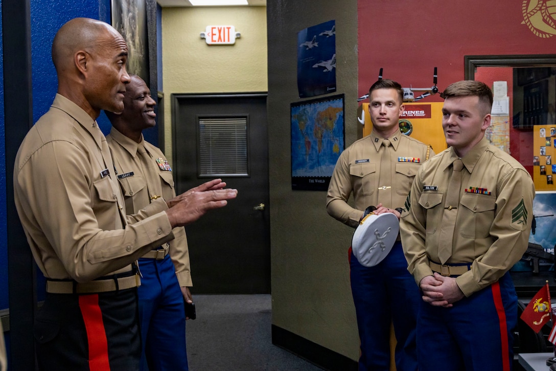 U.S. Marine Corps Brig. Gen. David C. Hyman, left, the commanding general of Western Recruiting Region, speaks with Sgt. Kyle Bolton, right, a canvassing recruiter with Recruiting Substation Oklahoma City South, during a visit to Recruiting Substation Oklahoma City South, Recruiting Station Oklahoma City, in Oklahoma City, Oklahoma, Feb. 5, 2026. The visit from WRR leadership was an opportunity to directly engage with the recruiting force and assess recruiting operations across the station’s area of operations. (U.S. Marine Corps photo by Staff Sgt. Lennon Dregoiw)