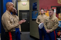 U.S. Marine Corps Brig. Gen. David C. Hyman, left, the commanding general of Western Recruiting Region, speaks with Sgt. Kyle Bolton, right, a canvassing recruiter with Recruiting Substation Oklahoma City South, during a visit to Recruiting Substation Oklahoma City South, Recruiting Station Oklahoma City, in Oklahoma City, Oklahoma, Feb. 5, 2026. The visit from WRR leadership was an opportunity to directly engage with the recruiting force and assess recruiting operations across the station’s area of operations. (U.S. Marine Corps photo by Staff Sgt. Lennon Dregoiw)