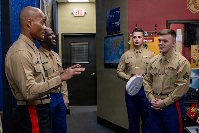 U.S. Marine Corps Brig. Gen. David C. Hyman, left, the commanding general of Western Recruiting Region, speaks with Sgt. Kyle Bolton, right, a canvassing recruiter with Recruiting Substation Oklahoma City South, during a visit to Recruiting Substation Oklahoma City South, Recruiting Station Oklahoma City, in Oklahoma City, Oklahoma, Feb. 5, 2026. The visit from WRR leadership was an opportunity to directly engage with the recruiting force and assess recruiting operations across the station’s area of operations. (U.S. Marine Corps photo by Staff Sgt. Lennon Dregoiw)