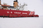 USCGC Polar Star (WAGB 10) crew members pose for a group photo while the cutter sits hove-to in the Ross Sea during Operation Deep Freeze 2026, Jan. 12, 2026. The cutter turns 50 years old on Jan. 17, 2026 amid Operation Deep Freeze, which is a joint service, inter-agency support operation for the National Science Foundation that manages the United States Antarctic Program. (U.S. Coast Guard photo by Petty Officer 2nd Class Christopher Bokum)