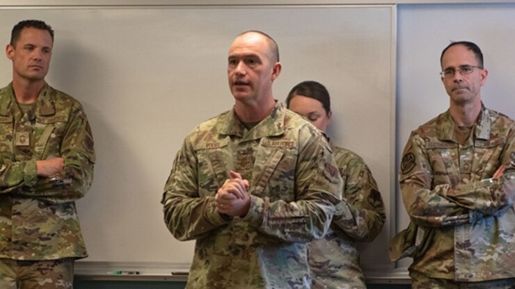 U.S. Air Force Chief Master Sergeant Carl Vogel, 319th Reconnaissance Wing command chief, speaks to airmen assigned to the 319th RW during the unveiling of a newly decorated Etchberger Airman Leadership School classroom, July 2, 2024, at Grand Forks Air Force Base, North Dakota.