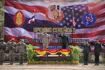 Leaders from the U.S. Army’s 1-2 Stryker Brigade Combat Team, 7th Infantry Division and the Royal Thai Army 112th Stryker Brigade render salutes during the opening ceremony of Hanuman Guardian 26 in Lopburi, Thailand on March 9, 2026, paying respects to each other’s national anthems.