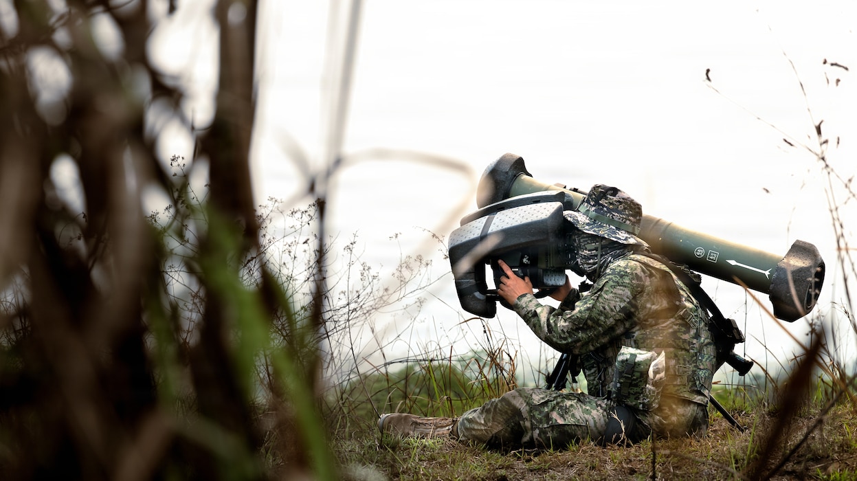 THAILAND (March 5, 2026) — Republic of Korea Marine Corps Sgt. Seungno Kim, a squad leader assigned to Firearms Company, 82nd Battalion, 8th Brigade, 2nd Marine Division, prepares to fire an AT-1K Raybolt during a combined arms live-fire range part of Exercise Cobra Gold 2026 at Ban Chan Khrem, Khao Khitchakut district, Thailand, March 5, 2026.