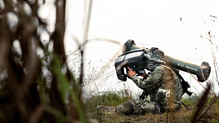 THAILAND (March 5, 2026) — Republic of Korea Marine Corps Sgt. Seungno Kim, a squad leader assigned to Firearms Company, 82nd Battalion, 8th Brigade, 2nd Marine Division, prepares to fire an AT-1K Raybolt during a combined arms live-fire range part of Exercise Cobra Gold 2026 at Ban Chan Khrem, Khao Khitchakut district, Thailand, March 5, 2026.