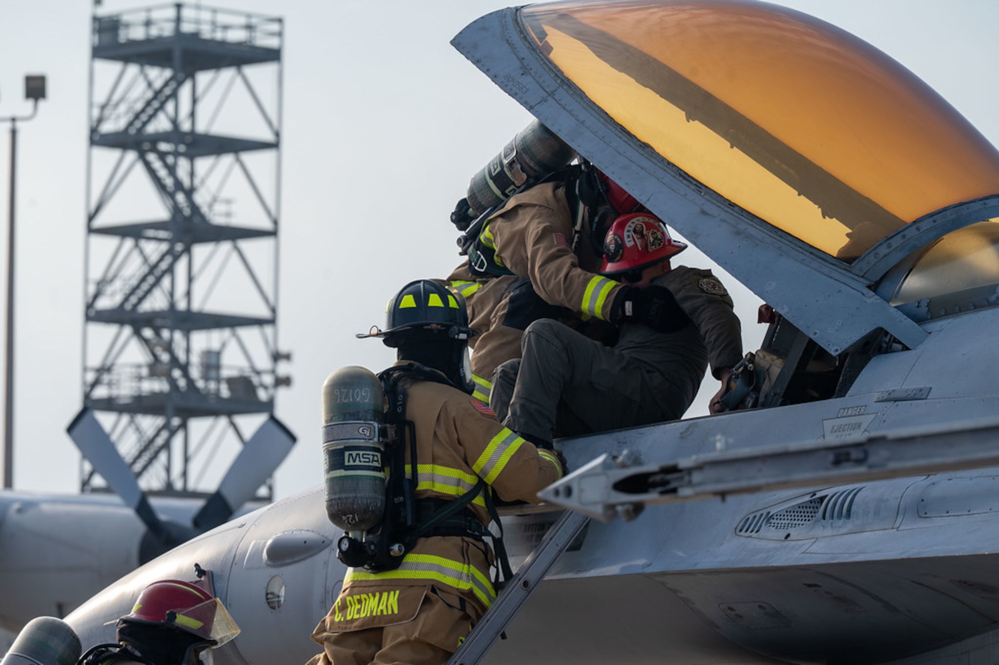 U.S. Air Force Firefighters demonstrate an emergency pilot extraction during a during a visit from Air Force Chief of Staff Gen. Ken Wilsbach and Chief Master Sgt. of the Air Force David Wolfe to Goodfellow Air Force Base, Texas, March 10, 2026.