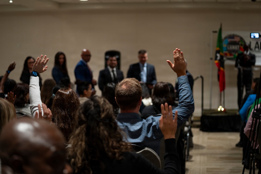 Attendees raise their hands during remarks at the Lesser Antilles Medical Assistance Team (LAMAT) 2026 closing ceremony in Frigate Bay, Saint Kitts and Nevis, March 6, 2026.
LAMAT 2026 strengthened professional relationships between U.S. Air Force medical personnel and Ministry of Health providers across the federation. (U.S. Air Force photo by Andrea Jenkins)