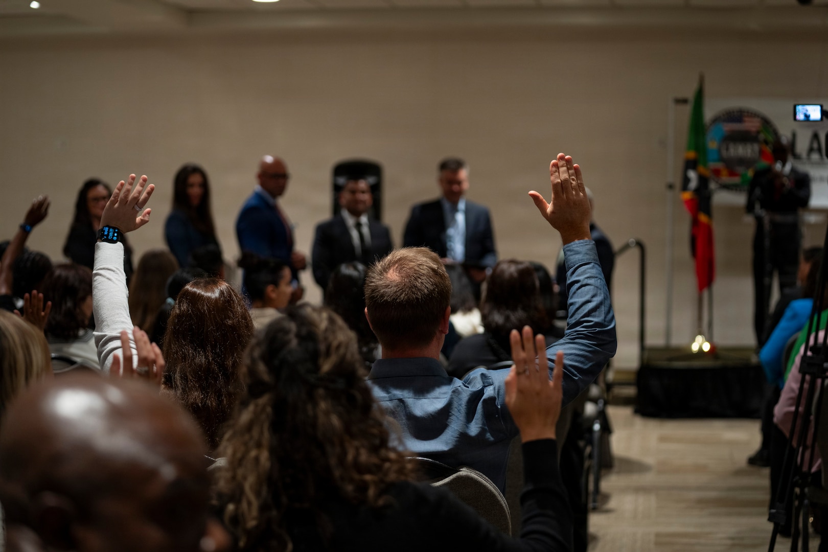 Attendees raise their hands during remarks at the Lesser Antilles Medical Assistance Team (LAMAT) 2026 closing ceremony in Frigate Bay, Saint Kitts and Nevis, March 6, 2026.
LAMAT 2026 strengthened professional relationships between U.S. Air Force medical personnel and Ministry of Health providers across the federation. (U.S. Air Force photo by Andrea Jenkins)