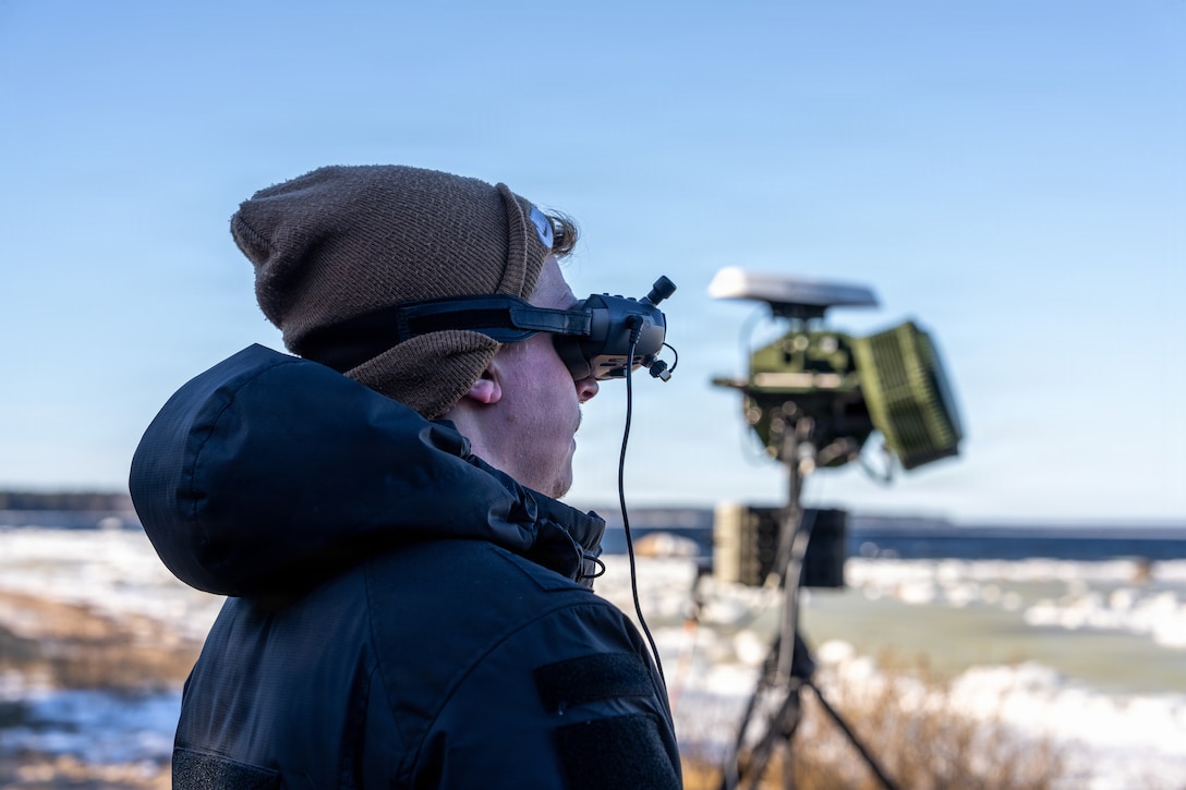 A civilian industry vendor pilots an air defense effector