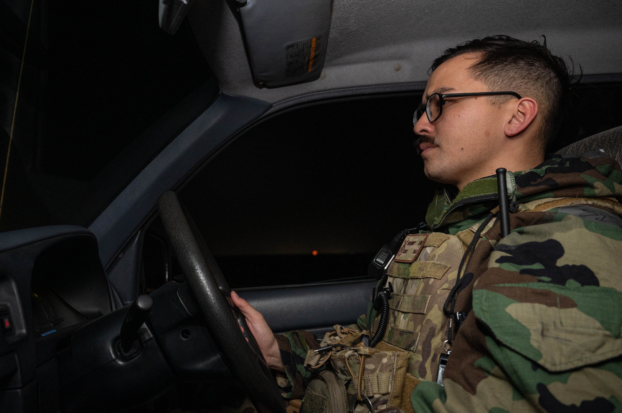 U.S. Air Force Staff Sgt. Gregory Lim, 18th Security Forces Squadron noncommissioned officer in charge of electronic security systems, patrols during a USAF-led operational exercise Beverly Midnight 26 at Kadena Air Base, Japan, March 12, 2026. BM26 provides an opportunity for U.S forces across Japan to train for real-world contingencies, strengthening coordination, readiness and regional defense capabilities. (U.S. Air Force photo by Airman 1st Class Nathaniel Jackson)