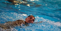 U.S. Marine Corps 2nd Lt. Slade A. Merk, a student with The Basic School, conducts water rescue swims during the Water Survival Advanced Course at Ramer Hall on Marine Corps Base Quantico, Virginia, Jan. 22, 2026. The week-long Water Survival Advanced course challenges Marines’ physical and mental limits through aquatic endurance training, including long swims, breath holds, and complex rescue drills vital to amphibious operations. (U.S. Marine Corps photo by Lance Cpl. Donovan E. Melendez)