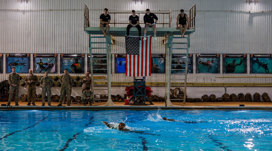 U.S. Marines perform water survival strokes during the Water Survival Advanced Course at Ramer Hall on Marine Corps Base Quantico, Virginia, Jan. 22, 2026. The week-long Water Survival Advanced course challenges Marines’ physical and mental limits through aquatic endurance training, including long swims, breath holds, and complex rescue drills vital to amphibious operations. (U.S. Marine Corps photo by Lance Cpl. Donovan E. Melendez)