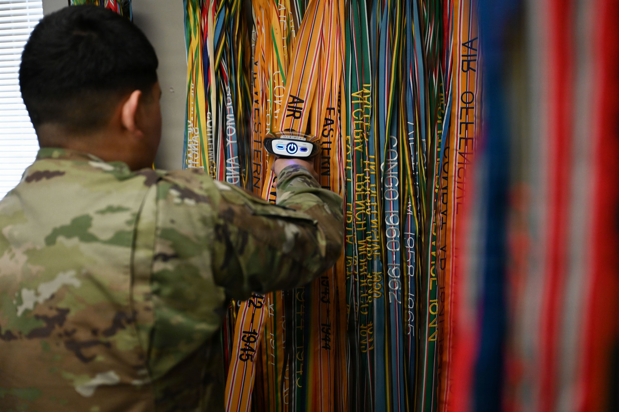U.S. Air Force Senior Airman Alexander Morquecho, a supply technician with the U.S. Air Force Honor Guard Supply, steams campaign streamers at Joint Base Anacostia-Bolling, Washington, D.C., March 4, 2026. Established to support the U.S. Air Force Honor Guard, the Honor Guard Supply section has the second largest flag room in the Department of War. (U.S. Air Force photo by Airman 1st Class Brandon Thomas)