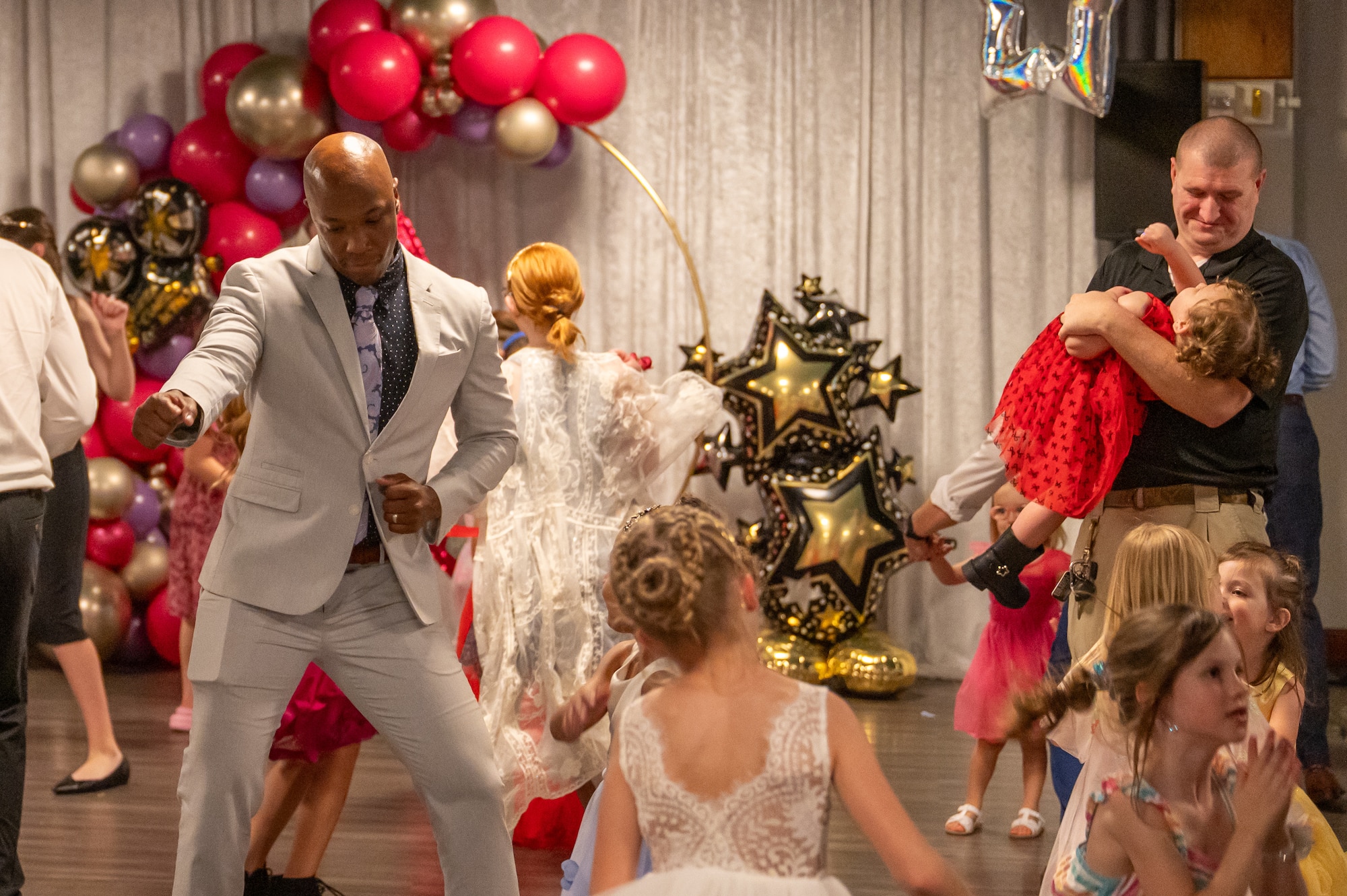 The Space Launch Delta 45 Chaplain’s Office hosted its annual Daddy-Daughter Dance on February 27, 2026. Approximately 80 parents and daughters attended the event, giving service members an opportunity to step away from launch operations and spend dedicated time with their children. (U.S. Space Force Photo by DeAnna Murano)