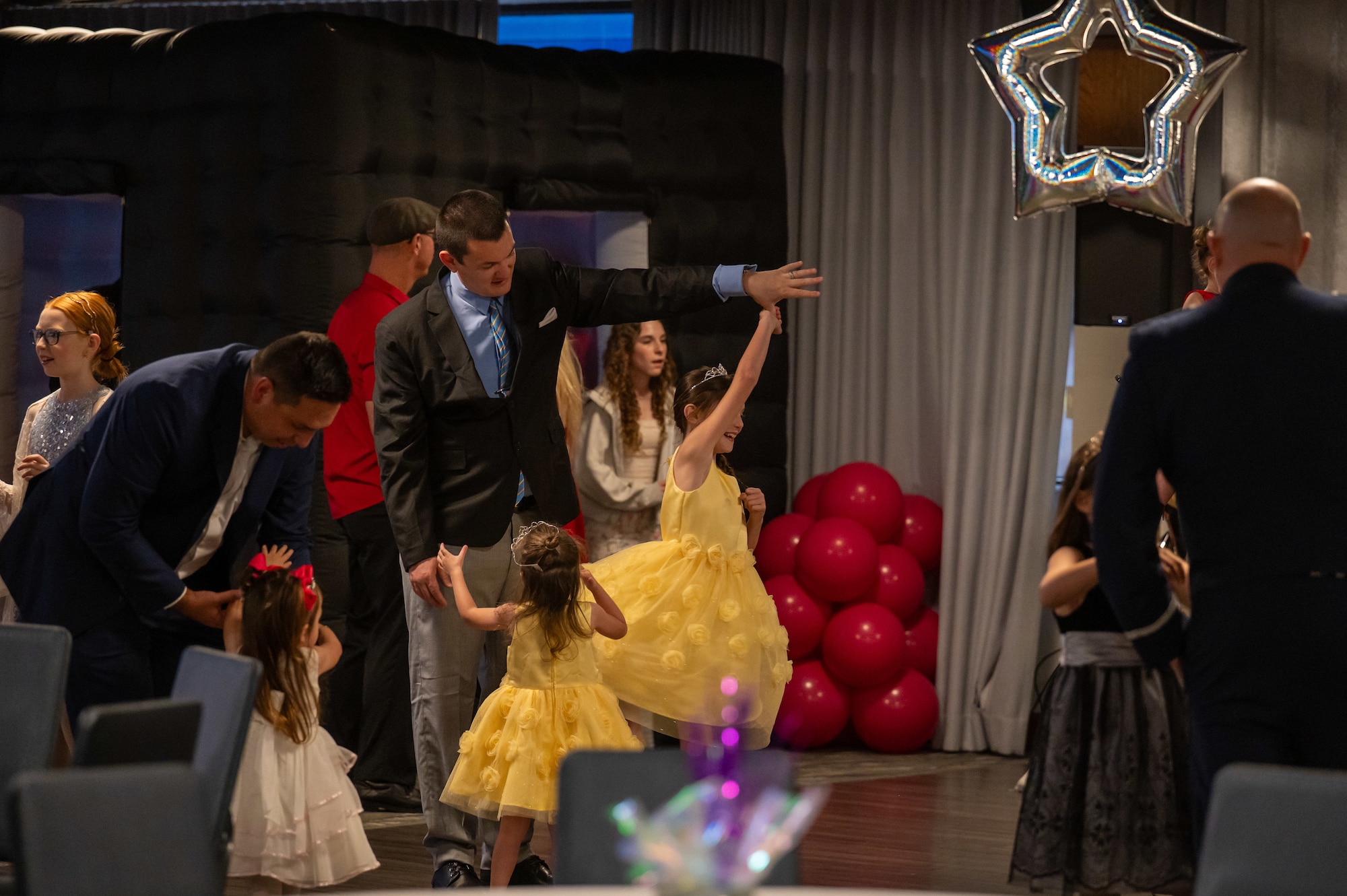 The Space Launch Delta 45 Chaplain’s Office hosted its annual Daddy-Daughter Dance on February 27, 2026. Approximately 80 parents and daughters attended the event, giving service members an opportunity to step away from launch operations and spend dedicated time with their children. (U.S. Space Force Photo by DeAnna Murano)