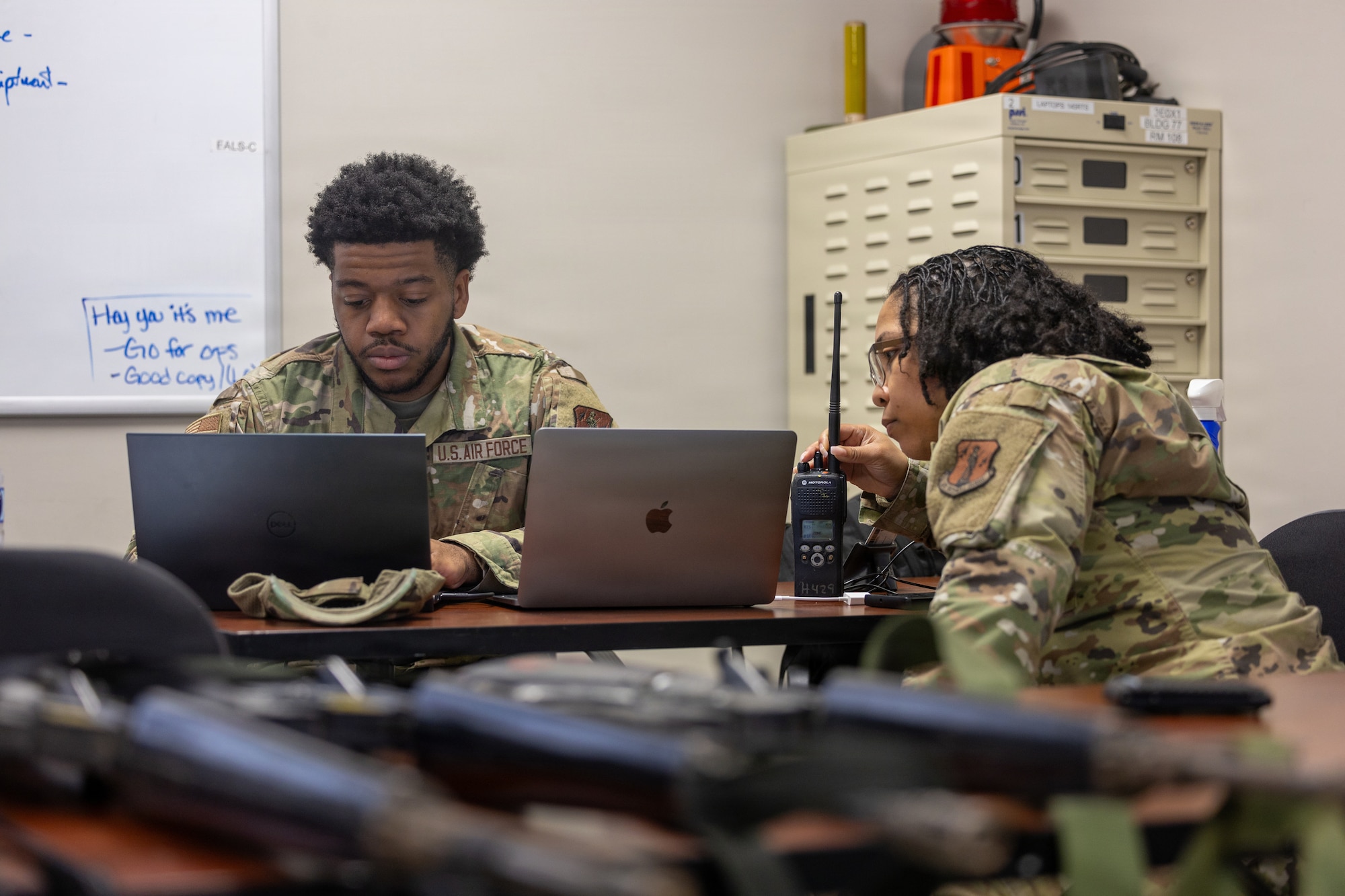 U.S. Air Force Senior Airman Christopher I. Dennis, 145th Civil Engineer Squadron (CES), operations management, left, and Tech. Sgt. Dionarea C. Marlowe, 145th CES, operations management, right, inputs data into an event log during Prime Base Engineer Emergency Force (BEEF) week 2026 at the Regional Training Site, New London, N.C., Feb. 23-27, 2026.