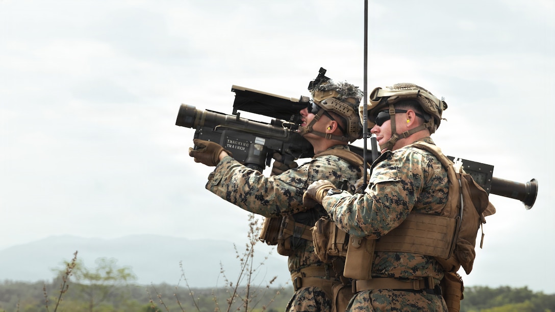 U.S. Marine Corps Cpl. Dominic Matiea, left, a low altitude air defense gunner, and Staff Sgt. Matthew Hazen, right, a section leader, both assigned to 1st Low Altitude Air Defense Battalion, Marine Air Ground Control Group 18, 1st Marine Aircraft Wing, prepare to fire an FIM-92 Stinger surface-to-air missile during the combined arms live-fire range part of Exercise Cobra Gold 2026 at Ban Chan Khrem, Khao Khitchakut district, Thailand, March 5, 2026. Cobra Gold is the Indo-Pacific’s largest annual military exercise in mainland Asia, co-hosted by the U.S. and Thailand. The exercise brings together participants from multiple nations for military training and humanitarian projects that strengthen regional partnerships and demonstrate U.S. commitment to Indo-Pacific security. (U.S. Marine Corps photo by Sgt. Brian Knowles)
