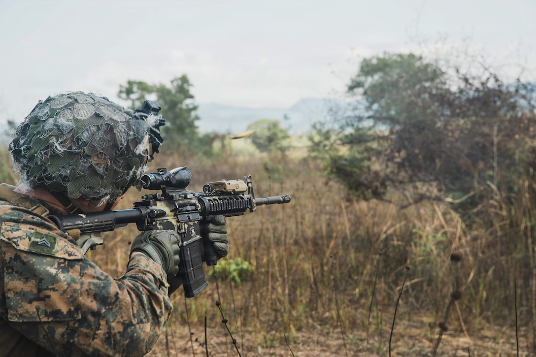 U.S. Marine Corps Cpl. Kayson Gudmundson, a ground electronic transmission systems maintainer assigned to Task Force Ashland, I Marine Expeditionary Force, fires an M4 carbine during a combined arms live-fire range as part of Exercise Cobra Gold 2026 at Ban Chan Khrem, Khao Khitchakut district, Thailand, March 6, 2026. Cobra Gold is the Indo-Pacific’s largest annual military exercise in mainland Asia, co-hosted by the U.S. and Thailand. The exercise brings together participants from multiple nations for military training and humanitarian projects that strengthen regional partnerships and demonstrate U.S. commitment to Indo-Pacific security. (U.S. Marine Corps photo by Cpl. Kenneth Twaddell)