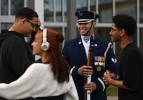 U.S. Air Force Senior Airman Wijeury Collado, ceremonial guardsman with the U.S. Air Force Honor Guard Drill Team, talks with Junior Reserve Officers’ Training Corps cadets during a visit to Campbell High School in Smyrna, Ga., March 11, 2026. The team performed a four-man drill that showcased precision, excellence and discipline to an audience of approximately 300 students and faculty members and encouraged students to pursue opportunities in the Air Force. (U.S. Air Force photo by Tech. Sgt. Sergio A. Gamboa)
