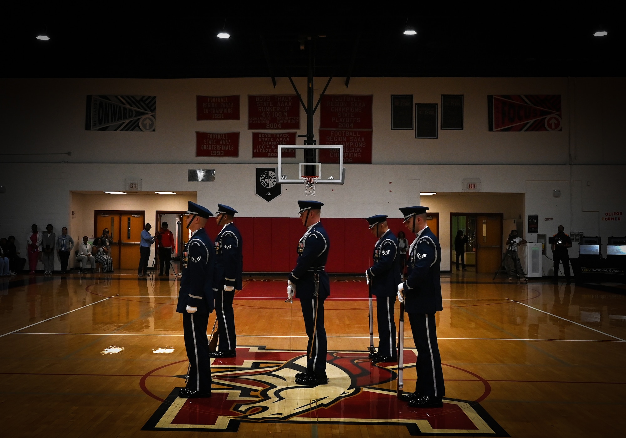 The U.S. Air Force Honor Guard Drill Team performs a routine during a visit to Ronald McNair Sr. High School in Atlanta, Ga., March 11, 2026. During the event, the Drill Team worked with local recruiters and high schools to emphasize the Air Force mission and inspire the next generation of service members. (U.S. Air Force photo by Tech. Sgt. Sergio A. Gamboa)