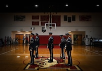 The U.S. Air Force Honor Guard Drill Team performs a routine during a visit to Ronald McNair Sr. High School in Atlanta, Ga., March 11, 2026. During the event, the Drill Team worked with local recruiters and high schools to emphasize the Air Force mission and inspire the next generation of service members. (U.S. Air Force photo by Tech. Sgt. Sergio A. Gamboa)