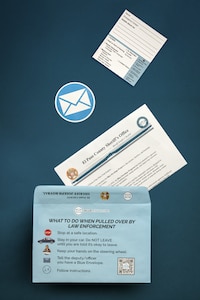 A graphic of a Blue Envelope with information cards on it.