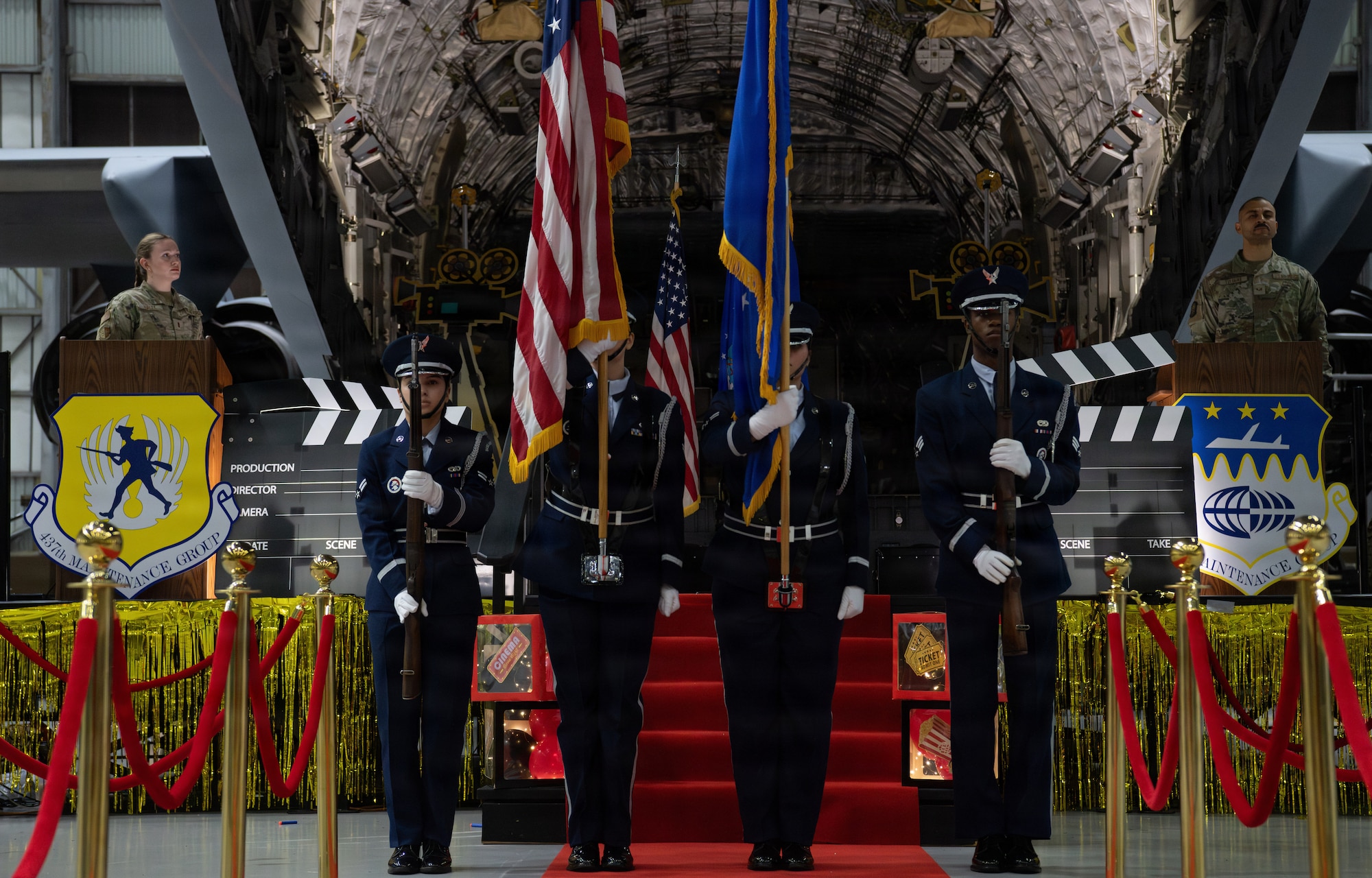 The 628th Honor Guard members line up in front of the stage to present the colors with flags at the 5th annual Knucklebuster Awards ceremony.
